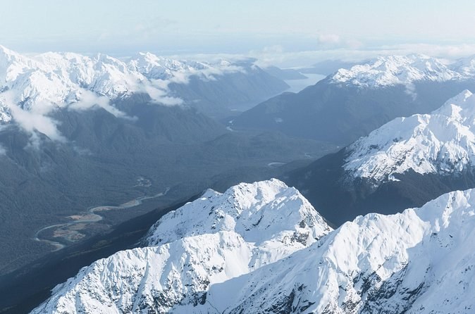Snow-covered mountain ranges seen from the air